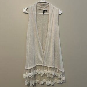 Cream sleeveless jacket